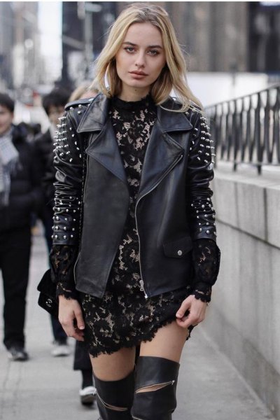 Black and silver spiked leather jacket and lace mini dress