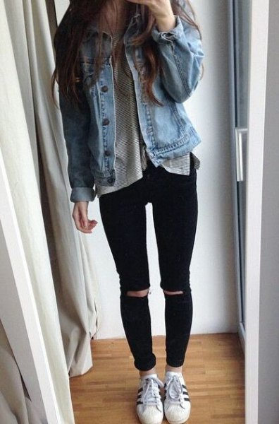 blue denim jacket with gray t-shirt and ripped jeans