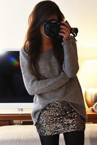 Gray oversized casual sweater with silver sequin mini skirt