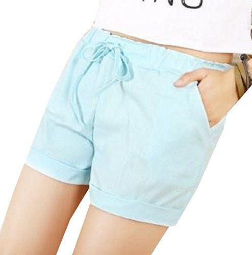 White cropped t-shirt paired with sky blue mini shorts with elastic waistband and cuffs
