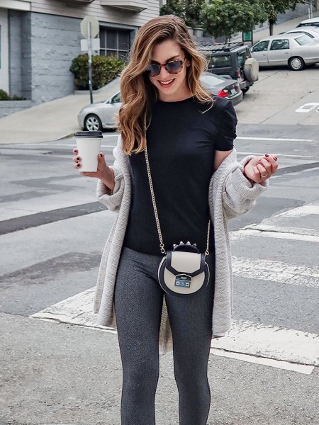 light gray longline cardigan with black t-shirt and knit pants