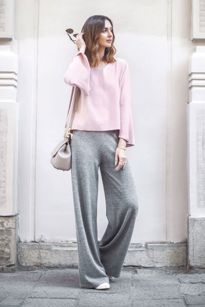 white long sleeve top with gray wide leg trousers