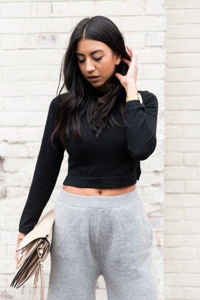 Black cropped turtleneck and gray wide-leg knit pants