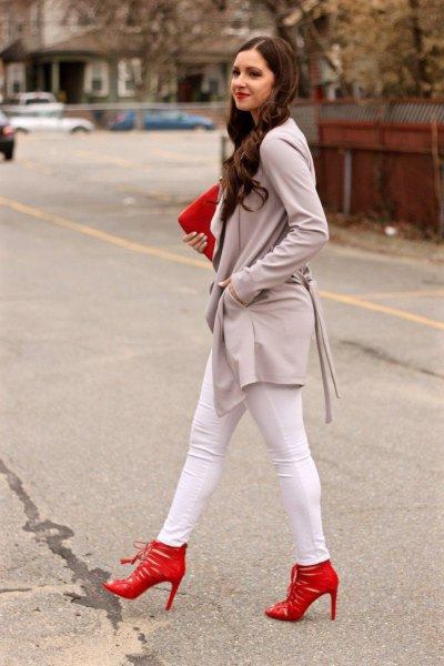 Grey, long casual blazer with white skinny jeans and red heels