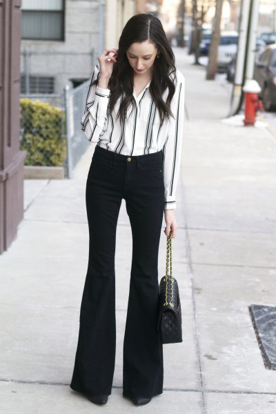 White and black striped shirt with buttons and flared
trousers