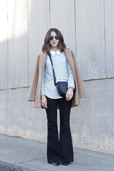White collared shirt, pink coat and black flared jeans