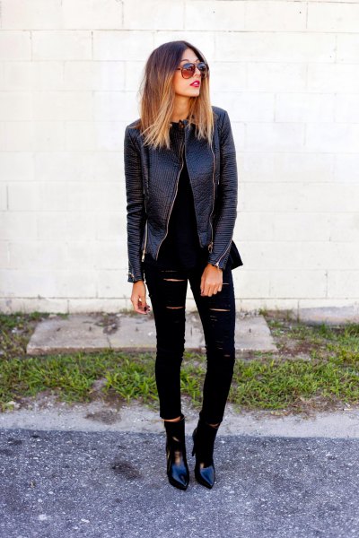 Black leather jacket with ripped skinny jeans and pointy
boots