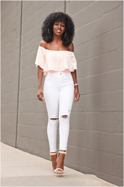 Pale yellow off the shoulder blouse with white ripped skinny
jeans