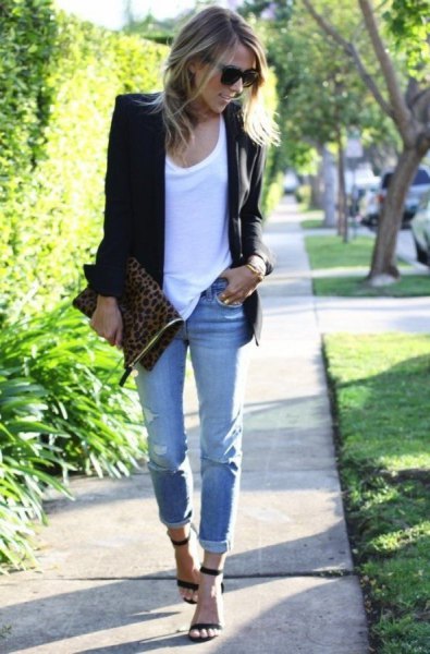 black blazer with white tank top and light blue cuffed jeans