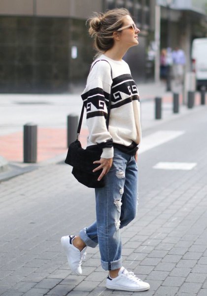 White and black tribal chunky sweater and cuffed boyfriend jeans
