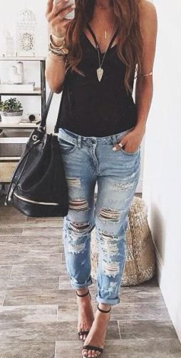 Black tank top with ripped boyfriend jeans and open heels