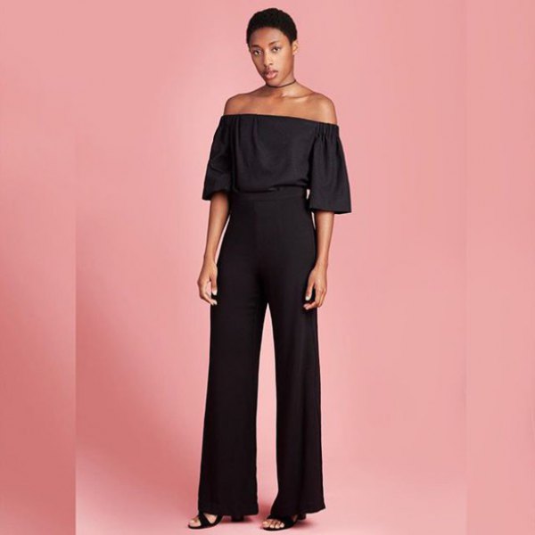 Black off the shoulder blouse with high rise wide leg trousers
