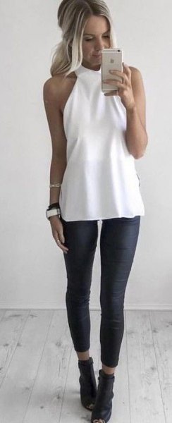 White halterneck tunic top with black cropped leggings