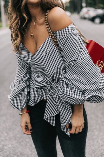 Black and white plunging V-neck top with plaid and knotted detailing