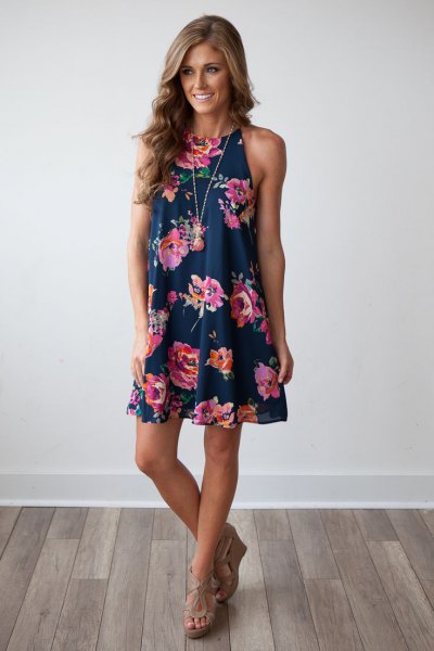 Navy blue floral print mini swing dress and nude heeled sandals
