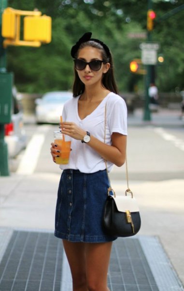 White V-neck t-shirt and button-front denim skirt