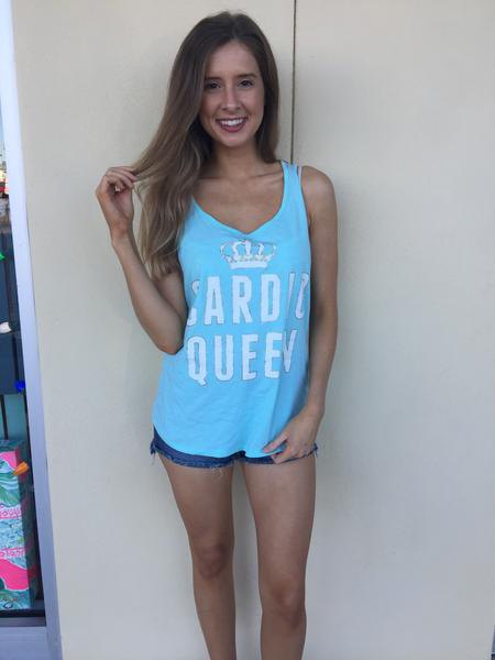 Sky blue V-neck graphic tank top paired with mini denim
shorts