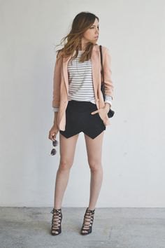 Light pink blazer with striped t-shirt and black mini fold-over skirt