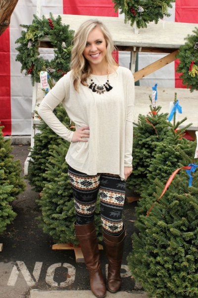 White long sleeve scoop neck t-shirt, fleece lined leggings and tribal print boots
