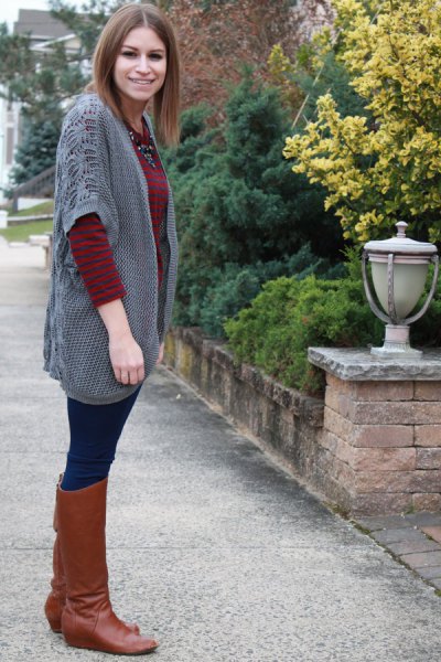 Gray loose cardigan with half sleeves and brown knee high leather boots