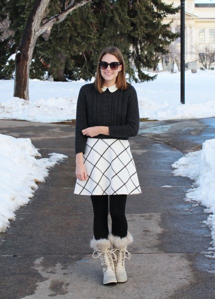 black ribbed sweater with white printed skater skirt