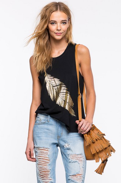 Black and gold tank top with ripped boyfriend jeans