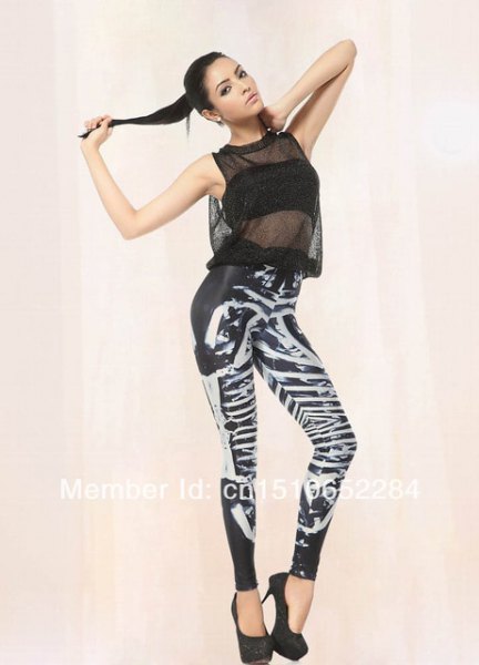 sleeveless chiffon top with black and white graphic leggings