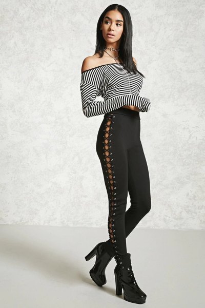 Black and white off the shoulder t-shirt with lace-up high-rise leggings