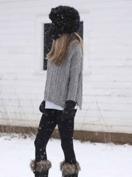 Gray chunky knit cable knit sweater and faux fur knee high boots