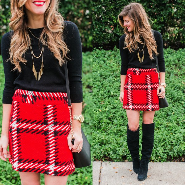 Black three-quarter sleeve sweater and red check wool high waisted
mini skirt