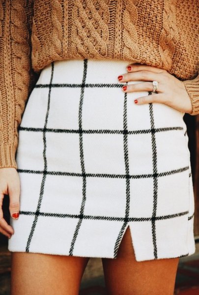 White plaid mini skirt with green cable knit chunky sweater