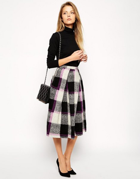 Turtleneck sweater with flared midi skirt in black and white wool