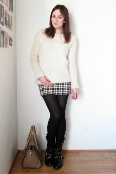 White fluffy sweater with checked wool mini skirt and
stockings