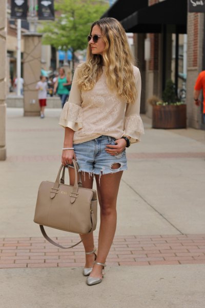 Light pink bell sleeve blouse and light blue ripped mini jean
shorts