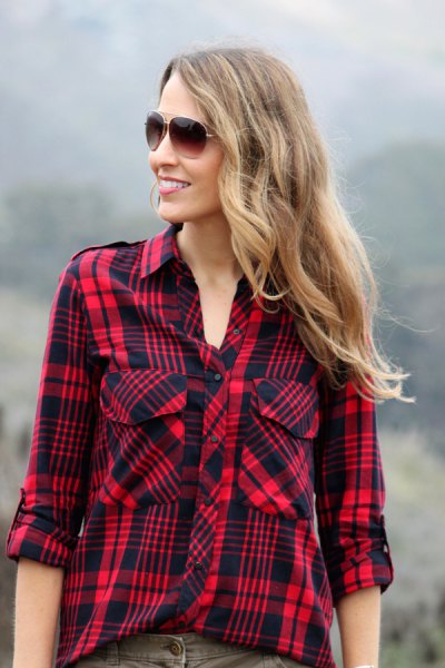 Red and black checked hiking shirt with gray jeans