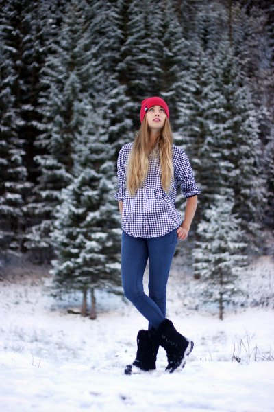 Black and white checked hiking shirt with snow boots