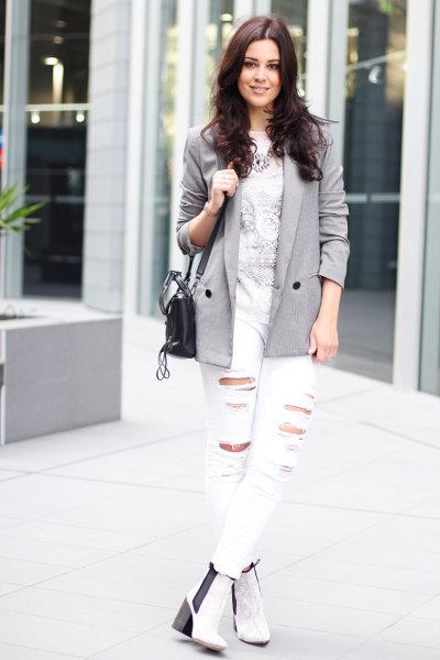 gray blazer with printed t-shirt and white ripped jeans