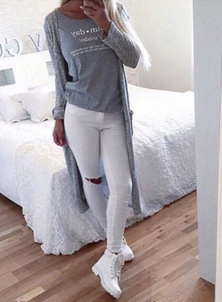 Gray long-knit cable knit cardigan, white skinny jeans and boots