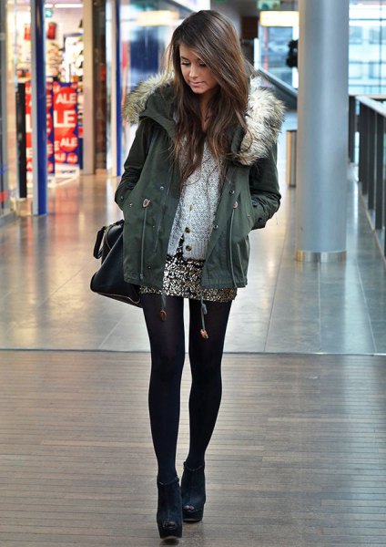 Gray parka jacket with fur hood and silver sequin mini skirt