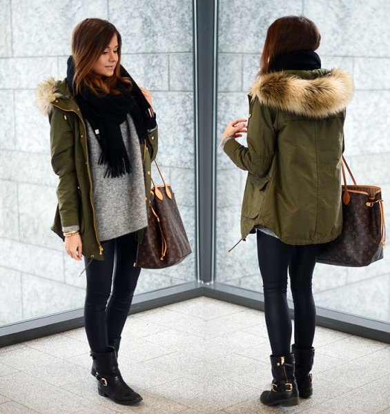 Green parka jacket with fur hood, gray sweater and black knitted scarf