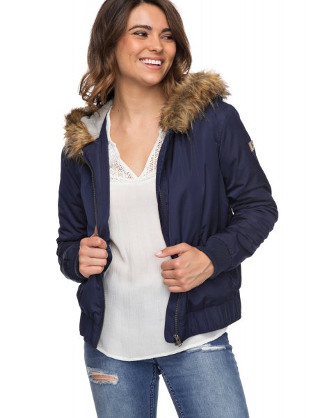 Navy blue bomber jacket with faux fur hood and chiffon blouse