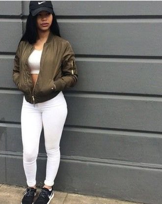 white crop top with matching skinny jeans and green bomber jacket