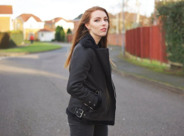 Black flight jacket with matching slim fit jeans and boots