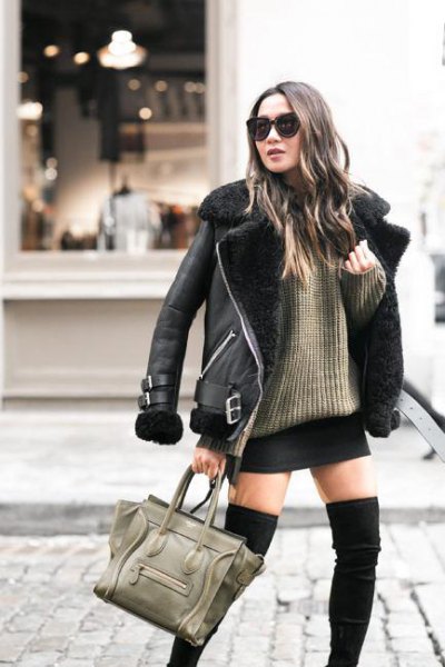 Fitted leather jacket with faux fur collar and green rib knit sweater