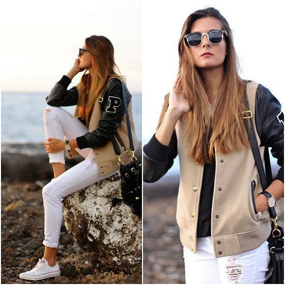 Two-tone pink and black leather varsity jacket with white jeans