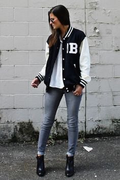 Black and white jacket with white t-shirt and gray cuffed skinny jeans