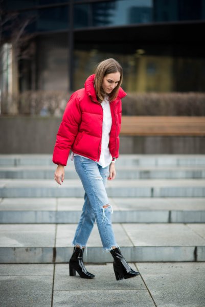 Red puffer jacket with white blouse and boyfriend jeans