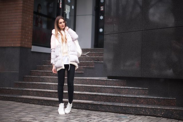 White, oversized, padded jacket with fitted sweater and tunic shirt