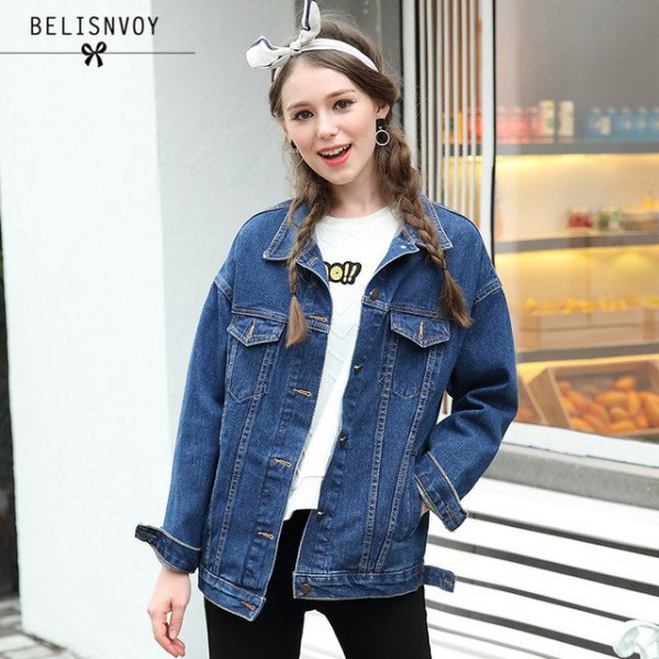 Denim jacket with white printed t-shirt and black jeans
