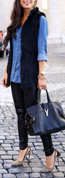 Blue chambray shirt with buttons and black long fur vest